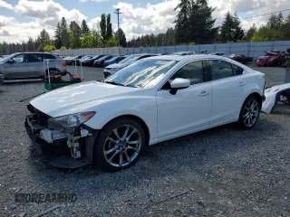 2015 Mazda 6 i Grand Touring with VIN JM1GJ1W64F1174086, listed as a Copart auction lot 56595965 with 100,399 mi miles and Salvage Title. Bid and sale history available at DreamBid. Image 1.
