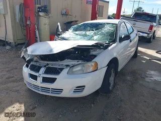 2004 Dodge Stratus SE with VIN 1B3EL36X34N138466, listed as a IAAI auction lot 41644466 with 138,916 mi miles. Bid and sale history available at carsss.com. Image 2.