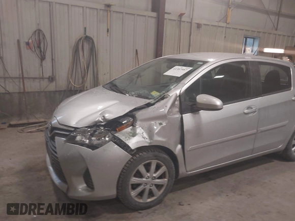 2016 Toyota Yaris L z VIN VNKKTUD32GA066699, wystawiony jako IAAI lot #41387987 z przebiegiem 76 595 mil mil oraz . Historia ofert i sprzedaży dostępna na DreamBid. Obrazek 6.