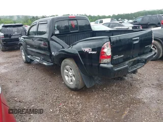 2013 Toyota Tacoma PreRunner with VIN 5TFKU4HN7DX004256, listed as a IAAI auction lot 42327449 with 266,113 mi miles and . Bid and sale history available at DreamBid. Image 3.