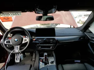 2021 BMW M5 z VIN WBS83CH0XMCH08885, wystawiony jako Copart lot #39373083 z przebiegiem Nie podano mil oraz . Historia ofert i sprzedaży dostępna na DreamBid. Obrazek 8.