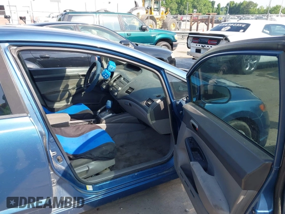 2011 Honda Civic LX with VIN 19XFA1F5XBE029404, listed as a IAAI auction lot 42261127 with 206,812 mi miles and . Bid and sale history available at DreamBid. Image 5.
