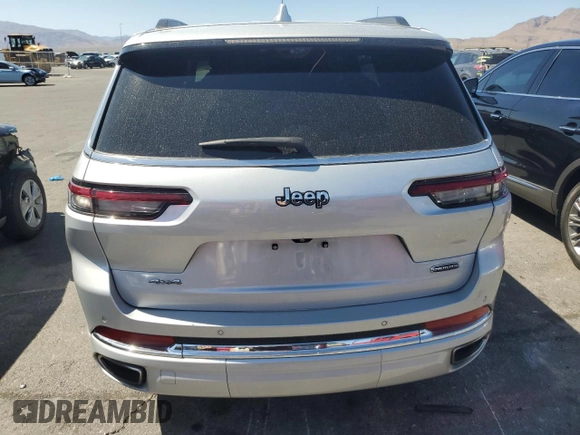 2021 Jeep Grand Cherokee Overland with VIN 1C4RJKDG8M8115783, listed as a Copart auction lot 61402645 with 55,387 mi miles and Salvage title. Bid and sale history available at DreamBid. Image 6.