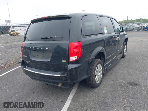 2018 Dodge Grand Caravan SE with VIN 2C7WDGBG5JR190468, listed as a IAAI auction lot 42173227 with 49,451 mi miles and . Bid and sale history available at DreamBid. Image 4.