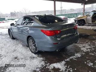 2015 Infiniti Q50 Premium with VIN JN1BV7AR4FM399046, listed as a IAAI auction lot 41560885 with 143,488 mi miles and . Bid and sale history available at DreamBid. Image 3.
