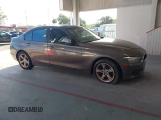 2013 BMW 3 Series 320i with VIN WBA3B1C54DK129838, listed as a IAAI auction lot 42752788 with 95,262 mi miles and . Bid and sale history available at DreamBid. Image 1.