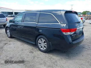 2014 Honda Odyssey EX-L with VIN 5FNRL5H66EB062158, listed as a IAAI auction lot 42072020 with 211,278 mi miles and . Bid and sale history available at carsss.com. Image 3.