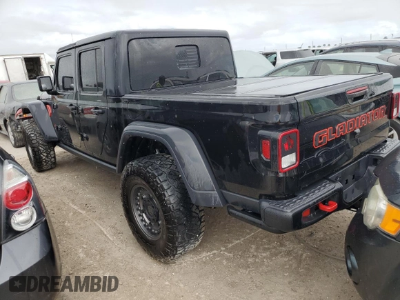 2022 Jeep Gladiator Rubicon with VIN 1C6JJTBG5NL101657, listed as a Copart auction lot 74682144 with 13,352 mi miles and Non repairable. Bid and sale history available at DreamBid. Image 2.
