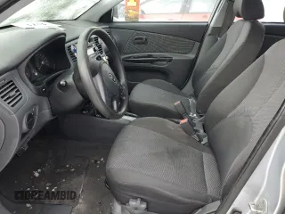 2010 Kia Rio with VIN KNADH4B38A6595734, listed as a Copart auction lot 46349825 with Not Provided miles and Salvage Title. Bid and sale history available at DreamBid. Image 7.