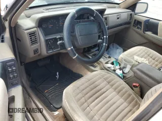 1995 Jeep Grand Cherokee Laredo с VIN 1J4GZ58S5SC724222, выставлен на аукционе Copart как лот 57837155 с пробегом 246 303 миль миль и Списание • Salvage title. История ставок и продаж доступна на DreamBid. Изображение 8.