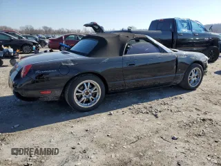 2004 Ford Thunderbird Deluxe z VIN 1FAHP60A24Y101788, wystawiony jako Copart lot #48224125 z przebiegiem 53 383 mil mil oraz Szkoda całkowita • Salvage title. Historia ofert i sprzedaży dostępna na DreamBid. Obrazek 3.