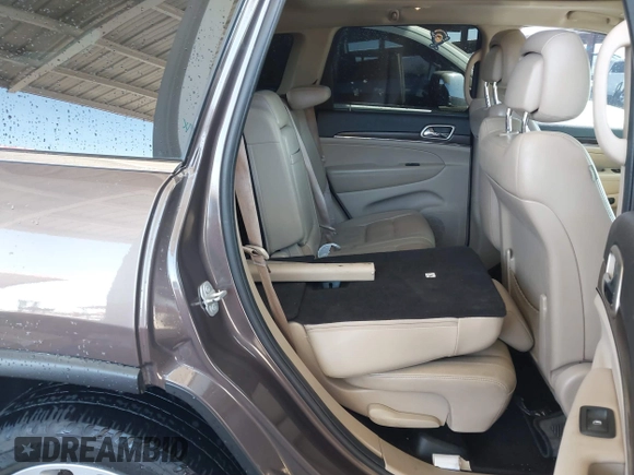 2017 Jeep Grand Cherokee Limited with VIN 1C4RJEBGXHC846920, listed as a IAAI auction lot 41718763 with 131,757 mi miles. Bid and sale history available at carsss.com. Image 7.
