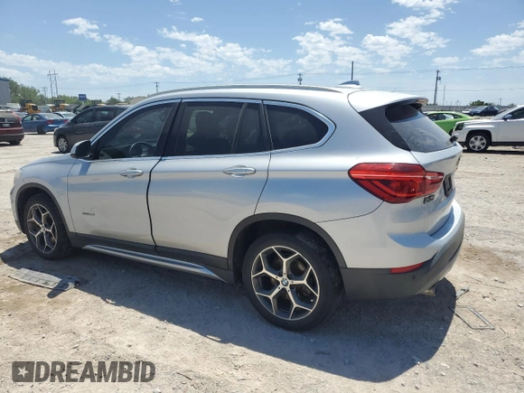 2018 BMW X1 sDrive28i z VIN WBXHU7C3XJ5H39960, wystawiony jako Copart lot #57095125 z przebiegiem 154 013 mil mil oraz Szkoda całkowita • Salvage title. Historia ofert i sprzedaży dostępna na DreamBid. Obrazek 2.