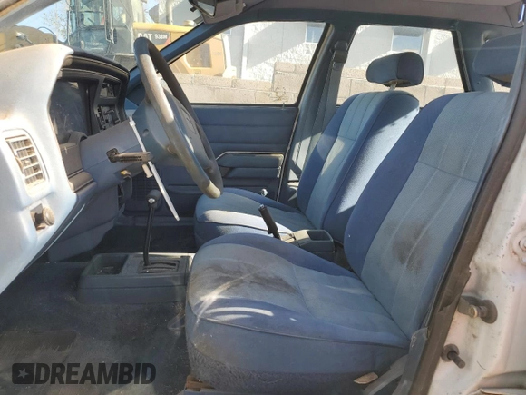 1986 Ford Tempo z VIN 1FABP22X4GK263512, wystawiony jako Copart lot #50618855 z przebiegiem 392 265 mil mil oraz Czysty tytuł • Clean title. Historia ofert i sprzedaży dostępna na DreamBid. Obrazek 7.