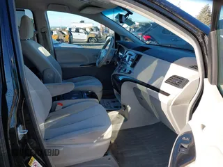 2011 Toyota Sienna LE AAS with VIN 5TDKK3DC8BS166694, listed as a IAAI auction lot 41506895 with 179,744 mi miles and . Bid and sale history available at DreamBid. Image 5.
