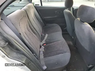 2001 Saturn SL z VIN 1G8ZK52761Z204012, wystawiony jako Copart lot #86618384 z przebiegiem 99 674 mil mil oraz Szkoda całkowita • Salvage title. Historia ofert i sprzedaży dostępna na DreamBid. Obrazek 10.
