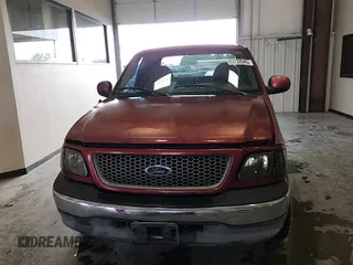 1999 Ford F-150 с VIN 1FTRX17W2XKB38205, выставлен на аукционе Copart как лот 63732045 с пробегом Не указан миль и Списание • Salvage title. История ставок и продаж доступна на DreamBid. Изображение 13.