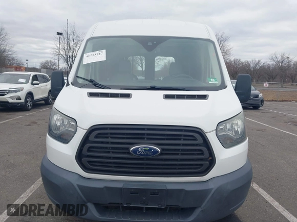 2016 Ford Transit Cargo with VIN 1FTYR1CM5GKA27058, listed as a IAAI auction lot 41753527 with 112,824 mi miles and . Bid and sale history available at DreamBid. Image 12.