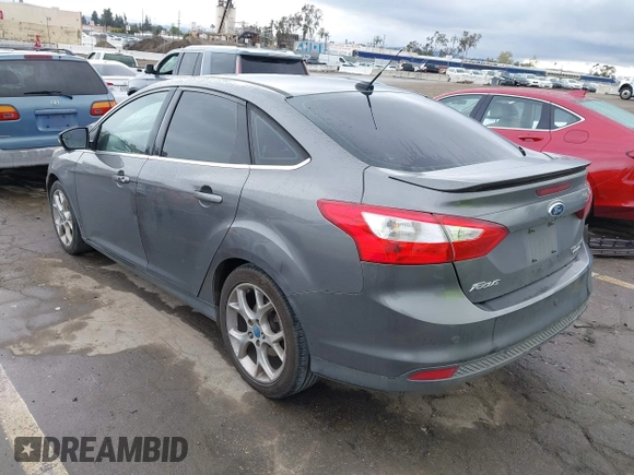 2013 Ford Focus Titanium with VIN 1FADP3J2XDL270393, listed as a IAAI auction lot 41814775 with 76,907 mi miles and . Bid and sale history available at carsss.com. Image 3.