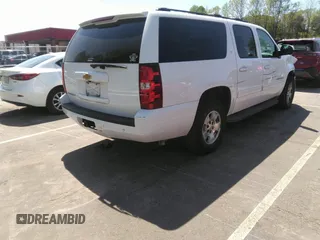 2014 Chevrolet Suburban LT with VIN 1GNSCJE05ER117663, listed as a IAAI auction lot 41992835 with 208,754 mi miles. Bid and sale history available at carsss.com. Image 4.