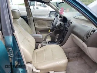 1997 Mitsubishi Galant ES z VIN 4A3AJ56G5VE019296, wystawiony jako Copart lot #56047635 z przebiegiem 87 533 mil mil oraz Szkoda całkowita • Salvage title. Historia ofert i sprzedaży dostępna na DreamBid. Obrazek 7.