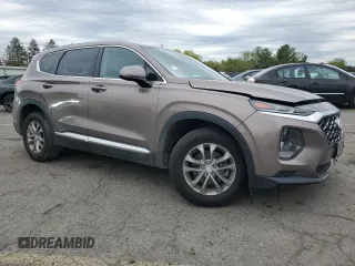 2019 Hyundai Santa Fe SE z VIN 5NMS2CAD0KH123337, wystawiony jako Copart lot #53883405 z przebiegiem 79 456 mil mil oraz Szkoda całkowita • Salvage title. Historia ofert i sprzedaży dostępna na DreamBid. Obrazek 4.