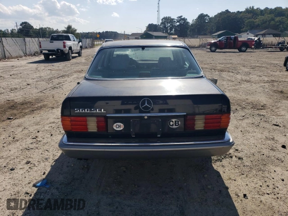 1987 Mercedes-Benz 560 with VIN WDBCA39D3HA355282, listed as a Copart auction lot 74798524 with 200,535 mi miles and Salvage Title. Bid and sale history available at DreamBid. Image 6.