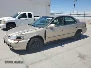 2001 Honda Accord LX z VIN 1HGCG56411A103876, wystawiony jako Copart lot #54959775 z przebiegiem 238 414 mil mil oraz Szkoda całkowita • Salvage title. Historia ofert i sprzedaży dostępna na DreamBid. Obrazek 1.