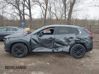 2024 Mazda CX-50 S Select z VIN 7MMVABAM9RN165867, wystawiony jako IAAI lot #41847913 z przebiegiem 17 134 mil mil oraz . Historia ofert i sprzedaży dostępna na DreamBid. Obrazek 14.