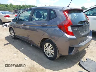 2015 Honda Fit LX with VIN 3HGGK5G57FM747786, listed as a IAAI auction lot 42656703 with 102,637 mi miles and . Bid and sale history available at DreamBid. Image 3.