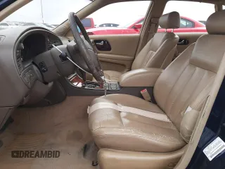 1994 Infiniti Q45 z VIN JNKNG01D1RM256994, wystawiony jako Copart lot #49919695 z przebiegiem 224 673 mil mil oraz Szkody całkowita. Historia ofert i sprzedaży dostępna na DreamBid. Obrazek 7.