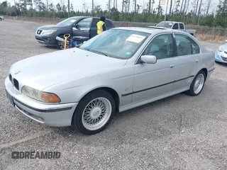 2000 BMW 5 Series 528iA with VIN WBADM6344YGU22084, listed as a IAAI auction lot 41734099 with 249,650 mi miles. Bid and sale history available at carsss.com. Image 2.