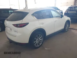 2019 Mazda CX-5 Grand Touring with VIN JM3KFBDM5K0520852, listed as a IAAI auction lot 42686818 with 36,800 mi miles and . Bid and sale history available at DreamBid. Image 4.