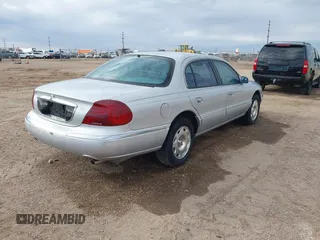 1998 Lincoln Continental with VIN 1LNFM97V8WY637860, listed as a IAAI auction lot 41746814 with 167,544 mi miles. Bid and sale history available at carsss.com. Image 4.