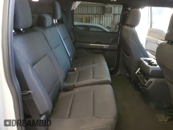 2023 Ford F-150 XL with VIN 1FTFW1E88PFD22387, listed as a Copart auction lot 49795405 with 14,057 mi miles and Salvage Title. Bid and sale history available at carsss.com. Image 10.