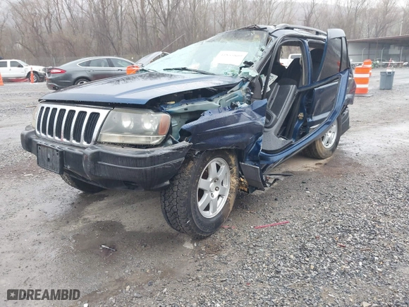2002 Jeep Grand Cherokee Laredo with VIN 1J4GW48S82C321712, listed as a IAAI auction lot 41855809 with 1 mi miles. Bid and sale history available at carsss.com. Image 2.
