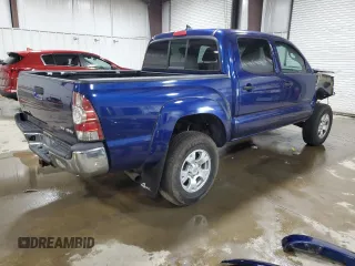 2015 Toyota Tacoma with VIN 3TMLU4EN6FM186016, listed as a Copart auction lot 58404675 with 127,536 mi miles and Salvage title. Bid and sale history available at DreamBid. Image 3.