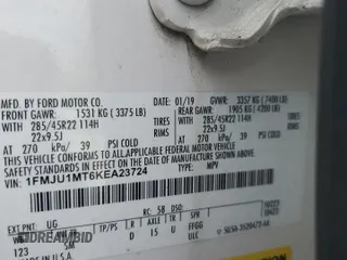 2019 Ford Expedition Platinum with VIN 1FMJU1MT6KEA23724, listed as a Copart auction lot 58489015 with 104,539 mi miles and Salvage title. Bid and sale history available at DreamBid. Image 14.