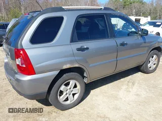 2010 Kia Sportage LX with VIN KNDKGCA38A7733453, listed as a IAAI auction lot 41932937 with 148,056 mi miles and . Bid and sale history available at carsss.com. Image 4.