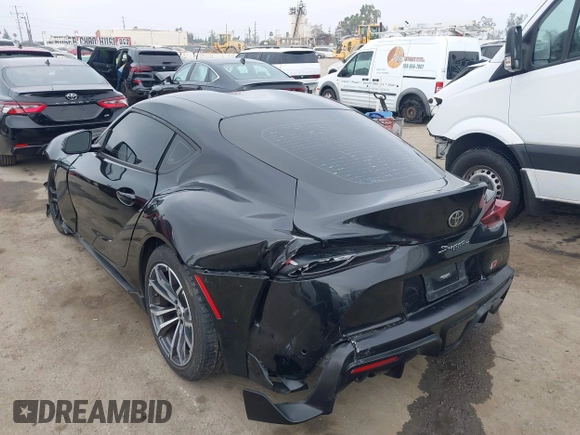 2021 Toyota Supra 2.0 with VIN WZ1DB2C07MW042723, listed as a IAAI auction lot 42635977 with 54,011 mi miles and . Bid and sale history available at DreamBid. Image 3.
