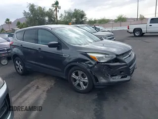 2016 Ford Escape SE z VIN 1FMCU0G9XGUB74257, wystawiony jako IAAI lot #42409400 z przebiegiem 101 854 mil mil oraz . Historia ofert i sprzedaży dostępna na DreamBid. Obrazek 1.