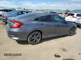 2019 Honda Civic Sport with VIN 2HGFC2F80KH523447, listed as a Copart auction lot 50557765 with 63,969 mi miles and Salvage Title. Bid and sale history available at DreamBid. Image 3.
