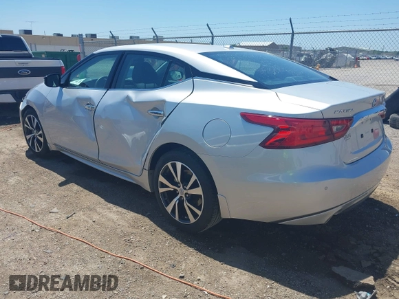 2016 Nissan Maxima SV z VIN 1N4AA6AP4GC434730, wystawiony jako IAAI lot #42231308 z przebiegiem 42 239 mil mil oraz . Historia ofert i sprzedaży dostępna na DreamBid. Obrazek 3.