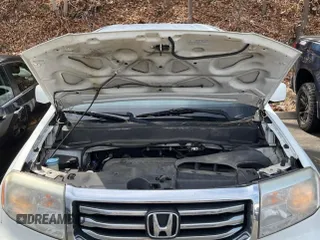 2015 Honda Pilot SE with VIN 5FNYF4H39FB028011, listed as a IAAI auction lot 42160830 with 202,846 mi miles and . Bid and sale history available at DreamBid. Image 10.