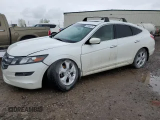 2010 Honda Crosstour EX-L z VIN 5J6TF2H58AL802121, wystawiony jako Copart lot #56338975 z przebiegiem 163 742 mil mil oraz Szkoda całkowita • Salvage title. Historia ofert i sprzedaży dostępna na DreamBid. Obrazek 1.