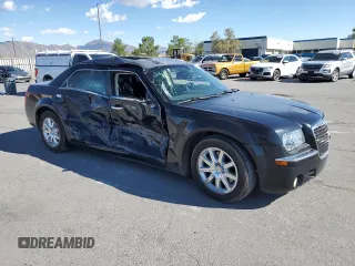 2009 Chrysler 300 with VIN 2C3KA63T69H626101, listed as a Copart auction lot 70259914 with 172,078 mi miles and Salvage Title. Bid and sale history available at carsss.com. Image 4.