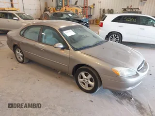 2003 Ford Taurus SES Standard with VIN 1FAFP55293G272187, listed as a IAAI auction lot 42154599 with 225,077 mi miles. Bid and sale history available at carsss.com. Image 1.