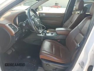 2015 Jeep Grand Cherokee Summit with VIN 1C4RJFJG3FC847797, listed as a Copart auction lot 54848085 with 53,506 mi miles and Salvage Title. Bid and sale history available at DreamBid. Image 7.