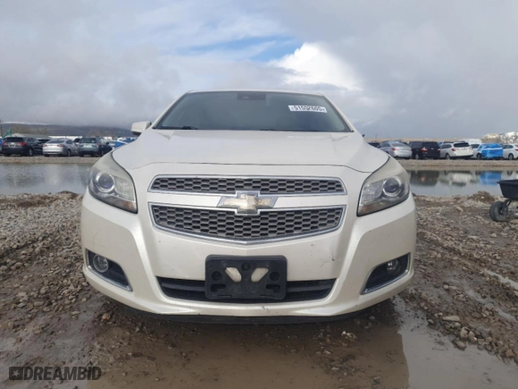2013 Chevrolet Malibu LTZ with VIN 1G11H5SA5DF129394, listed as a Copart auction lot 51552605 with 136,982 mi miles and Salvage Title. Bid and sale history available at carsss.com. Image 5.