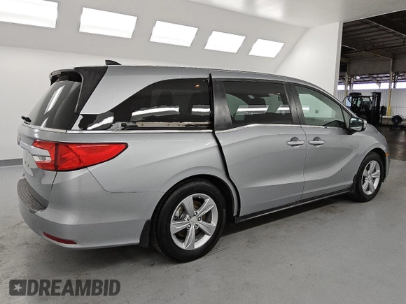 2018 Honda Odyssey EX-L с VIN 5FNRL6H78JB079617, выставлен на аукционе Copart как лот 55087295 с пробегом 185 534 миль миль и Чистый • Clean title. История ставок и продаж доступна на DreamBid. Изображение 3.